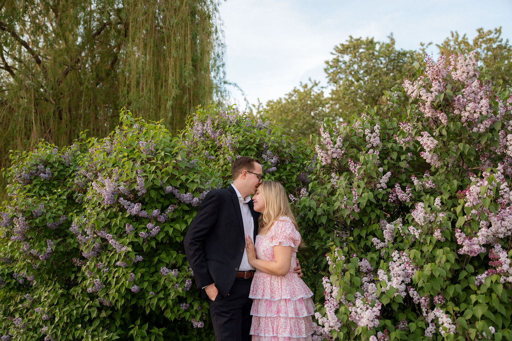 Ella and Benson in lilacs